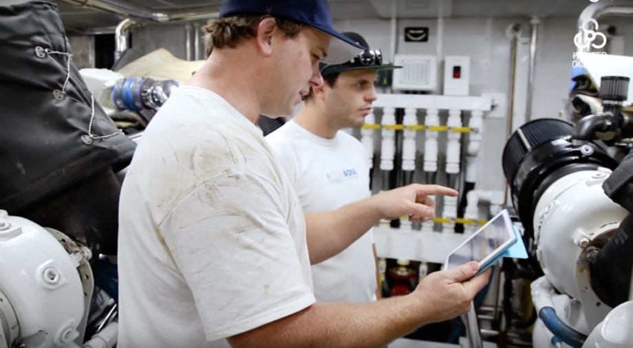 Engineers using a planned maintenance system as part of a handover